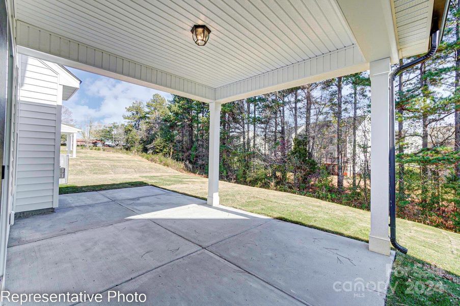 This home features a Covered Porch and extended patio