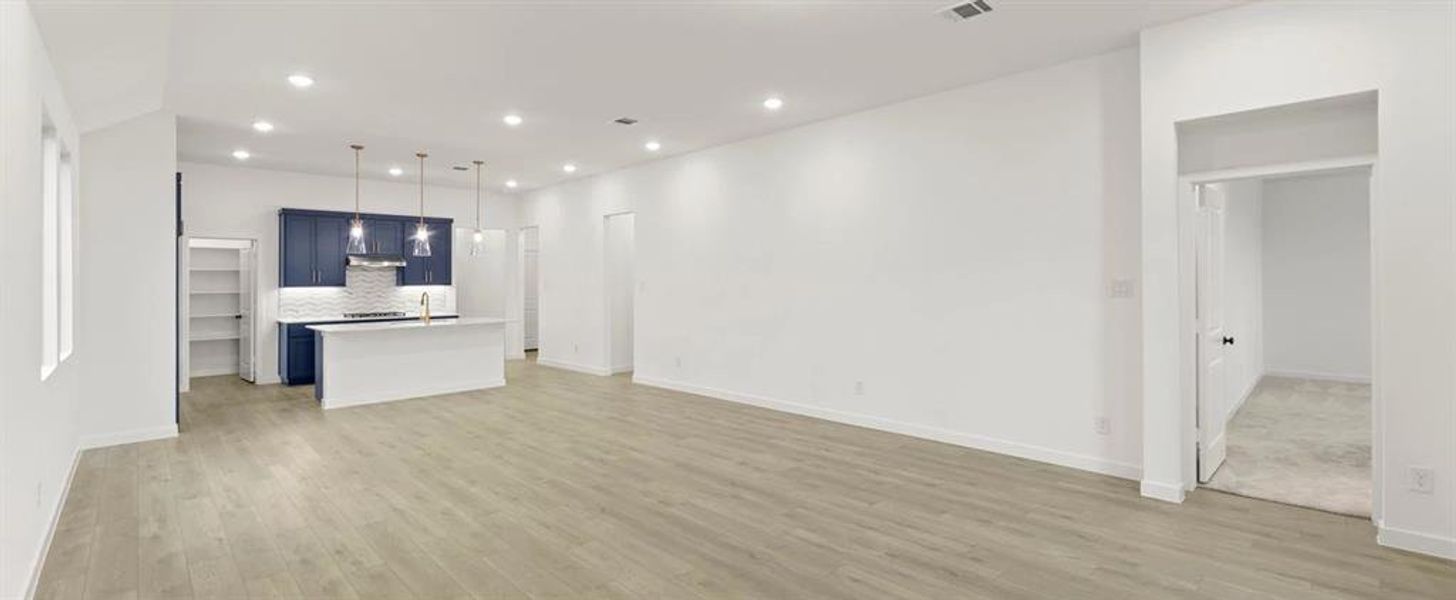 Open Kitchen-Living-Dining Room featuring the Sapphire Collection