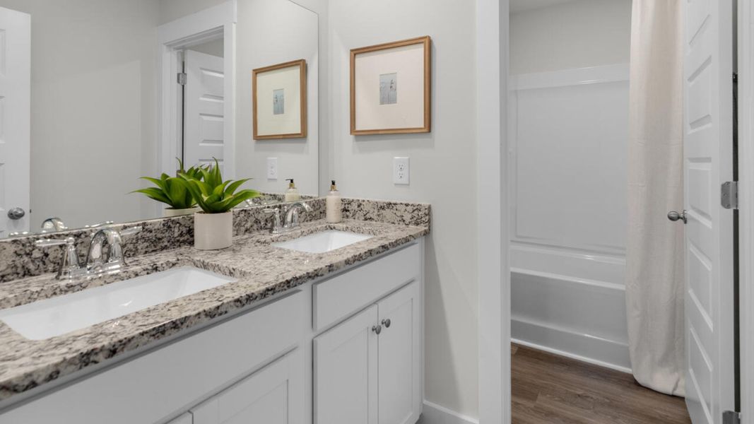 Furnished interior view inside a new home in Surfside Landing, Hubert (Image 36).