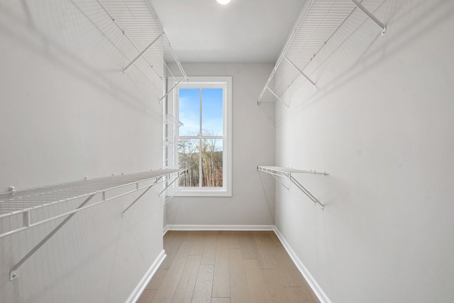 Representative unfurnished interior of a home built from the 
                        
                         by The Providence Group in Ward's Crossing Townhomes, Johns Creek (Image 24).