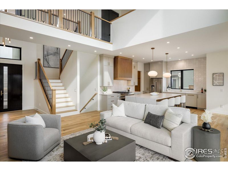 The epitome of an open floor plan includes this Great Room, eat-in Kitchen, Dining, open hallway/bridge and upstairs loft