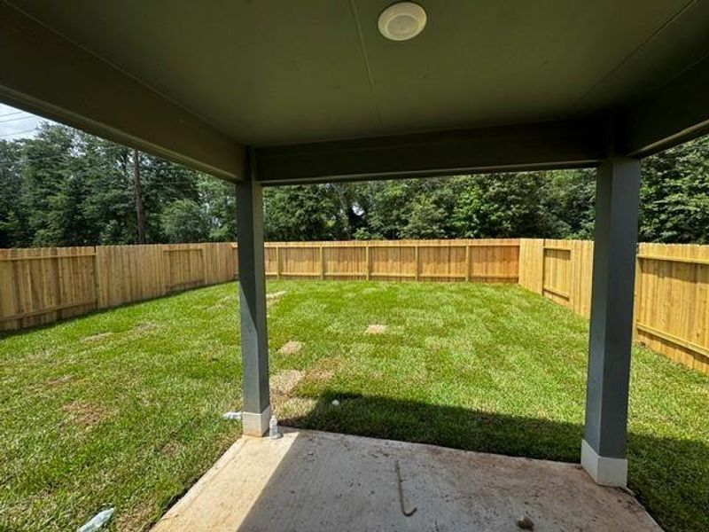 Exterior details and patio area of a home in Townsend Reserve, Splendora (Image 3).