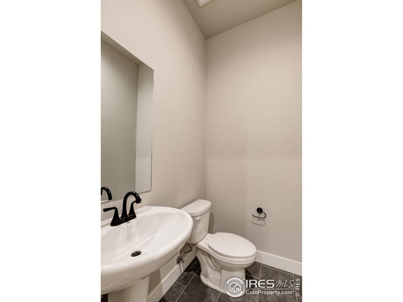 Powder Bath-  Photos not of the actual unit. Finishes vary.