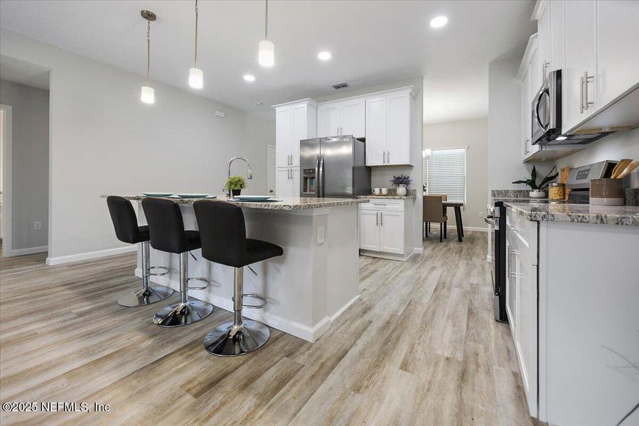 Furnished interior view inside a new home in , Jacksonville (Image 8). Furnished interior view inside a new home in , Jacksonville (Image 8).