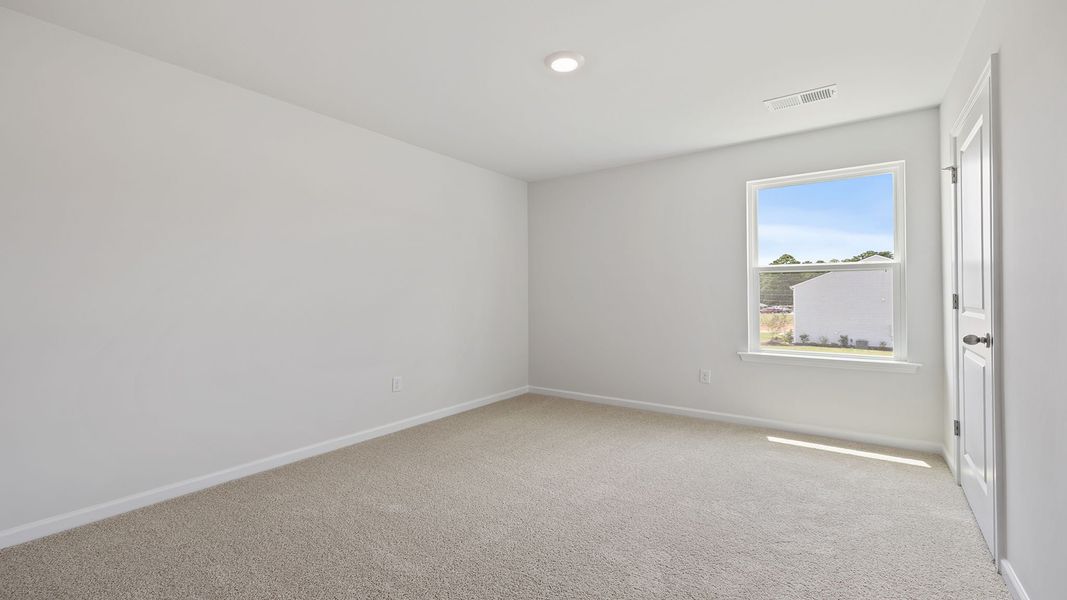 Spacious, unfurnished interior of a new home in Durbin Meadows Traditions, Fountain Inn (Image 23).