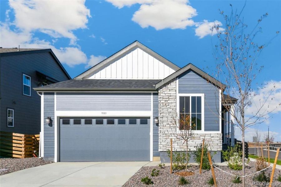 Front exterior of a new home in Legato, Commerce City, CO, highlighting curb appeal (Image 25).
