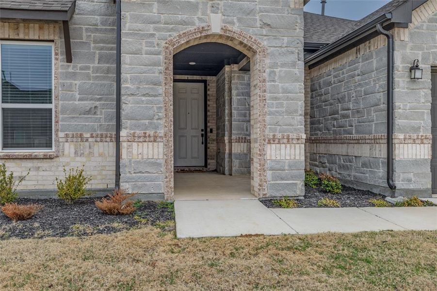 Exterior details and patio area of a home in The Preserve Estates, Northlake (Image 3).