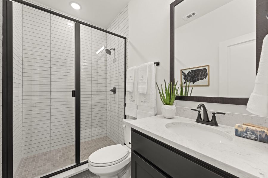 Representative furnished interior of a home built from the 6051 by Tradition Homes in StarView, Prosper (Image 49).