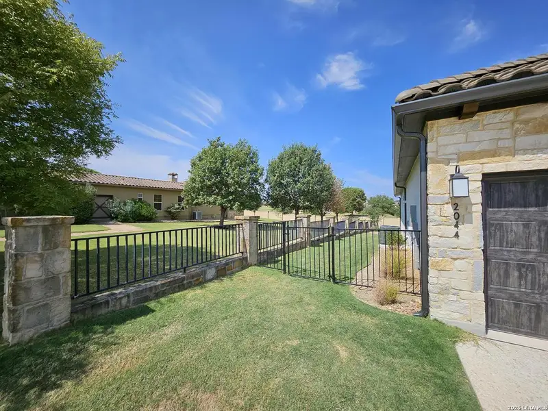 Exterior details and patio area of a home in , Kerrville (Image 18).