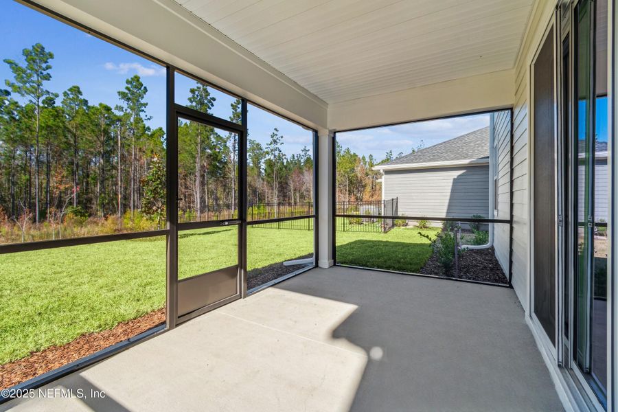Exterior details and patio area of a home in Tributary 70', Yulee (Image 3).