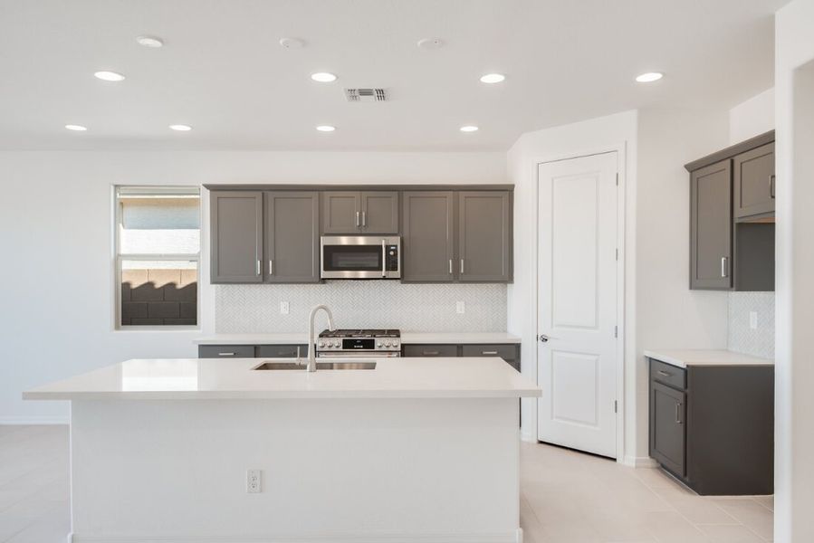 Representative furnished interior of a home built from the Quartz by Taylor Morrison in Artisan at Asante Discovery Collection, Surprise (Image 4). Representative furnished interior of a home built from the Quartz by Taylor Morrison in Artisan at Asante Discovery Collection, Surprise (Image 4).