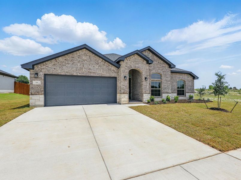 Representative exterior photo of a completed home built from the McKinley I by Cheldan Homes in Horizons at Bankston Estates, Venus, TX (Image 29).