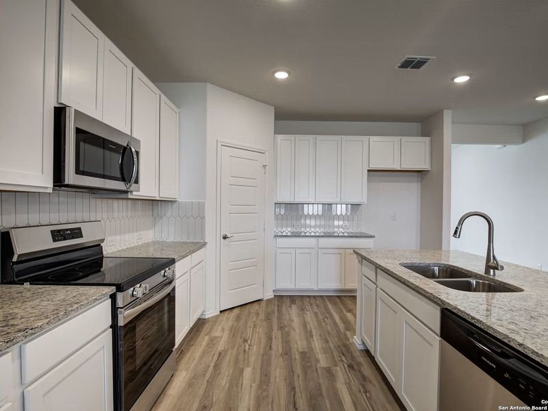 Furnished interior view inside a new home in Hannah Heights, Seguin (Image 7).