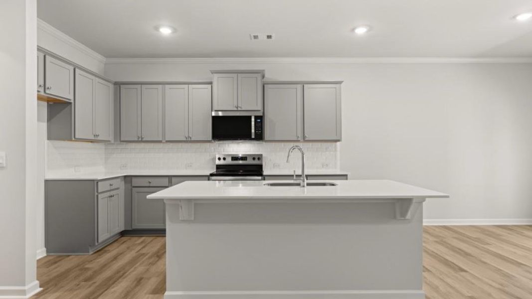 Furnished interior view inside a new home in Falcon Landing Townhomes, Gainesville (Image 6). Furnished interior view inside a new home in Falcon Landing Townhomes, Gainesville (Image 6).