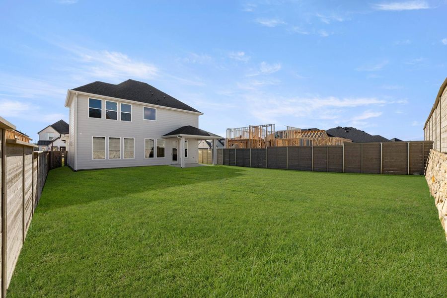 Exterior details and patio area of a home in Treeline, Justin (Image 4).