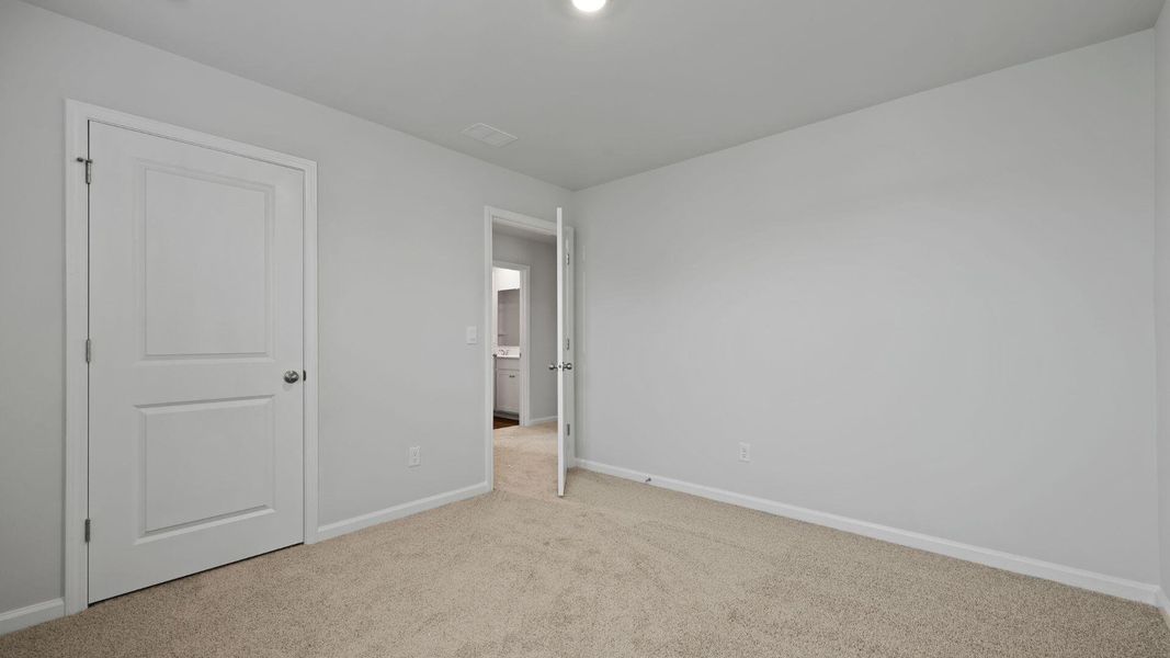 Spacious, unfurnished interior of a new home in Pine Hills at Cane Bay, Summerville (Image 19). Spacious, unfurnished interior of a new home in Pine Hills at Cane Bay, Summerville (Image 19).