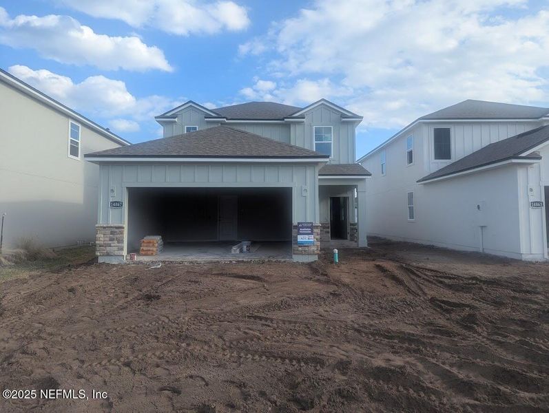 In-progress construction of a new home in Palm Series at The Landings at Pecan Park, Jacksonville, FL (Image 2).