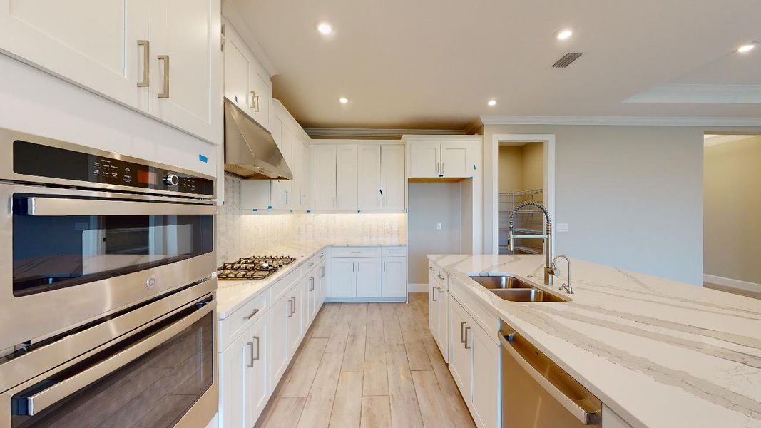 Representative furnished interior of a home built from the Azzurro by Taylor Morrison in Esplanade by the Islands, Naples (Image 5).