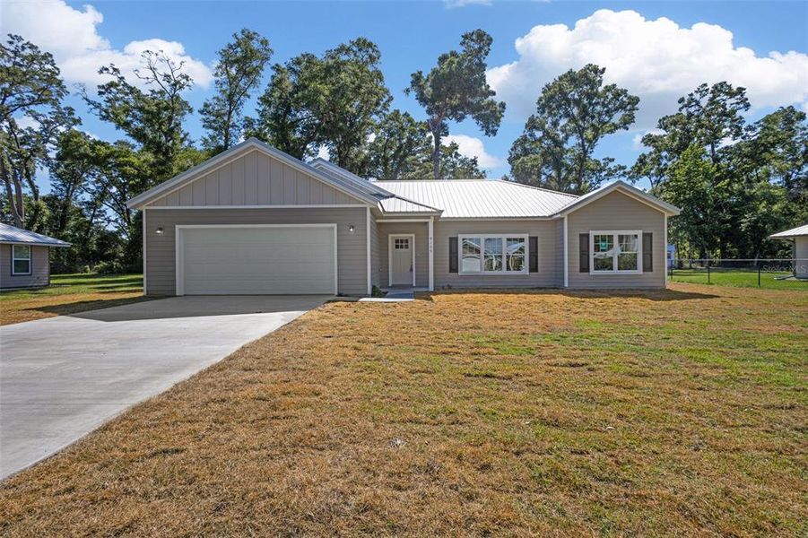 Front exterior of a new home in , Trenton, FL, highlighting curb appeal (Image 30).