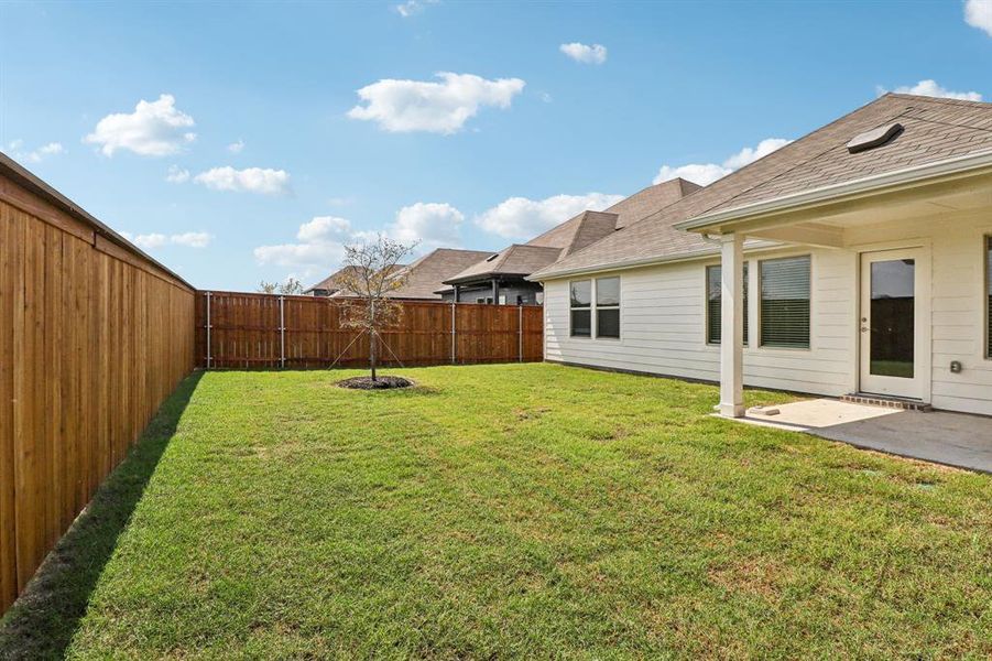Exterior details and patio area of a home in Lakehaven - Signature Series, Farmersville (Image 20).