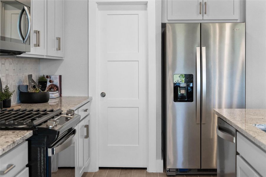 Enjoy meals in this sun-drenched space, featuring durable tile flooring, abundant natural light from the large windows, window seat, recessed lighting, and an access door to the back covered patio. Enjoy meals in this sun-drenched space, featuring durable tile flooring, abundant natural light from the large windows, window seat, recessed lighting, and an access door to the back covered patio.