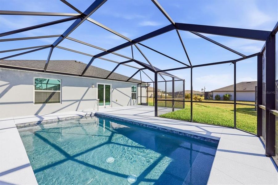 Exterior details and patio area of a home in Rotonda Lakes, Rotonda West (Image 22).