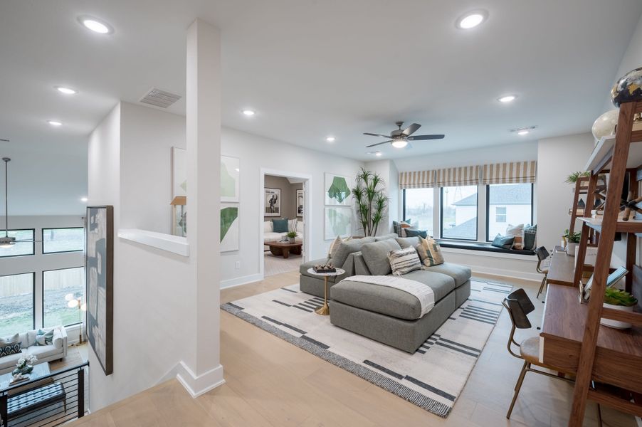 Representative furnished interior of a home built from the Barnhart by Tri Pointe Homes in Woodson’s Reserve, Spring (Image 71).