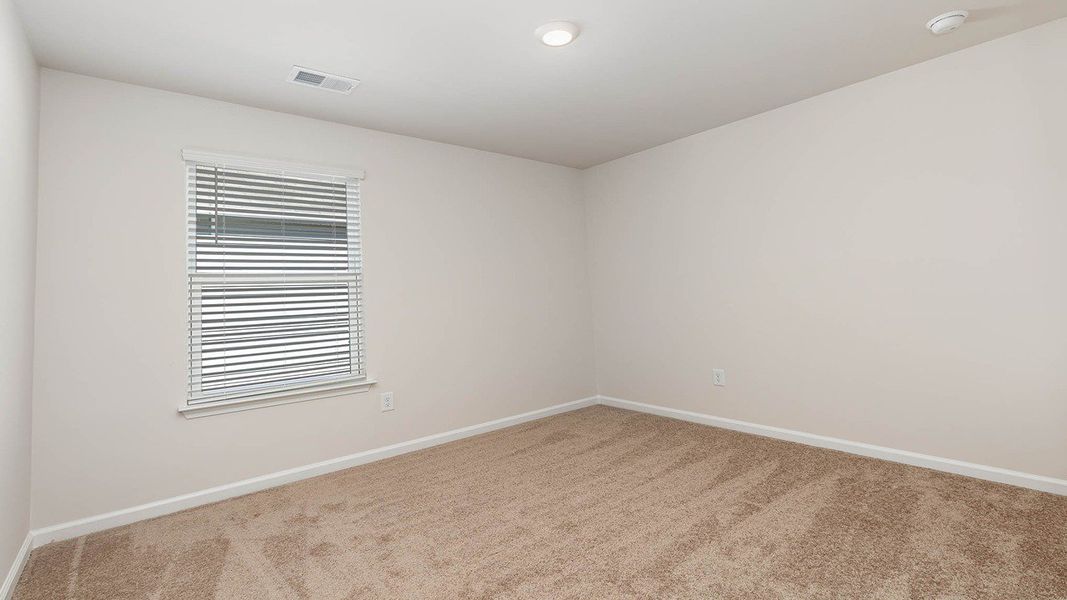 Spacious, unfurnished interior of a new home in The Meadows at Wildwood Village, Shallotte (Image 13).