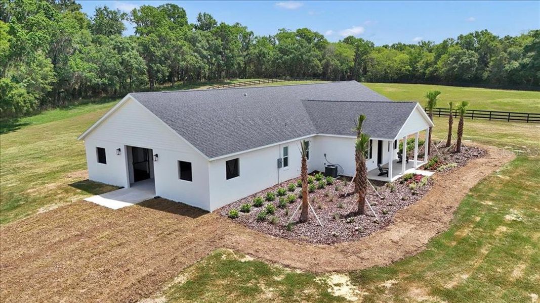 Front exterior of a new home in , Citra, FL, highlighting curb appeal (Image 2).