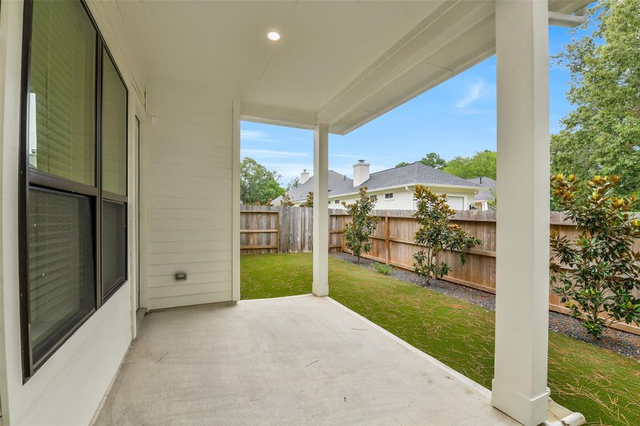 Exterior details and patio area of a home in Summer Place  35', Montgomery (Image 33).