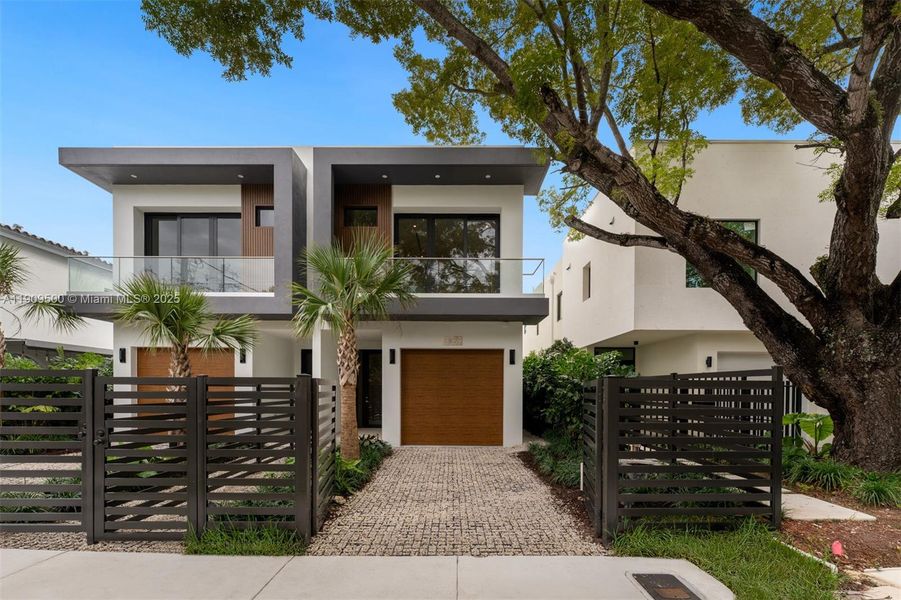 Front exterior of a new home in , Miami, FL, highlighting curb appeal (Image 2). Front exterior of a new home in , Miami, FL, highlighting curb appeal (Image 2).