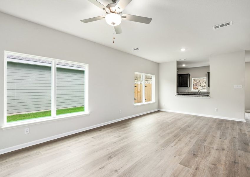 The family room has large windows that let in great, natural light. The family room has large windows that let in great, natural light.