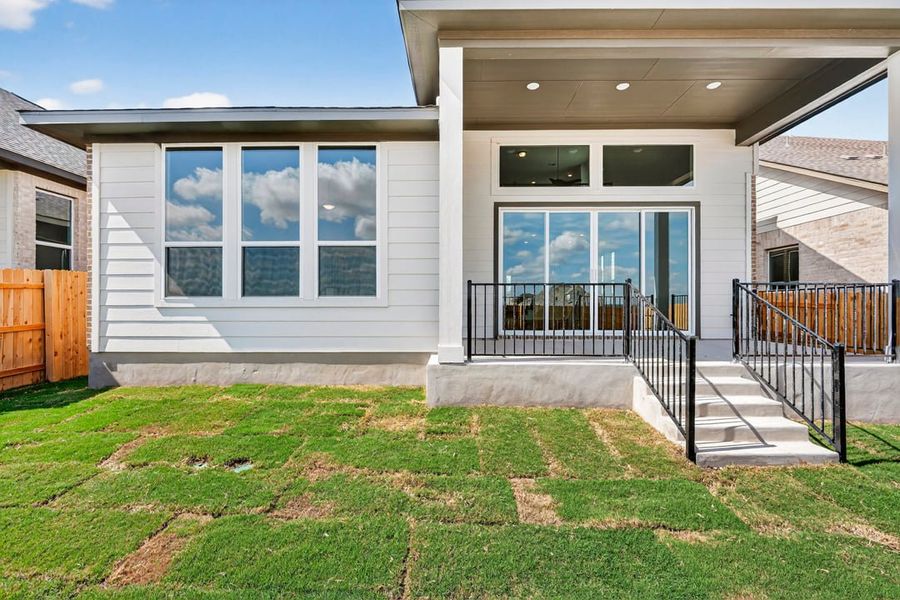 Exterior details and patio area of a home in Arbor Collection at Lariat, Liberty Hill (Image 24). Exterior details and patio area of a home in Arbor Collection at Lariat, Liberty Hill (Image 24).