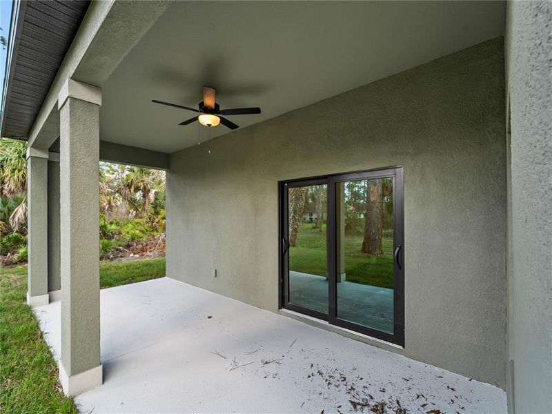 Exterior details and patio area of a home in , North Port (Image 35).
