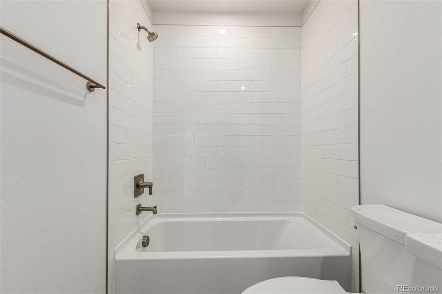 Furnished interior view inside a new home in Ascent at Inverness, Englewood (Image 5).