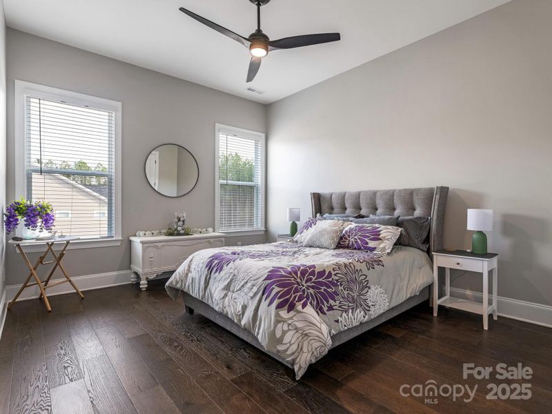 1st Flr, Bdrm, ceiling fan, and hardwood floors (14x12)