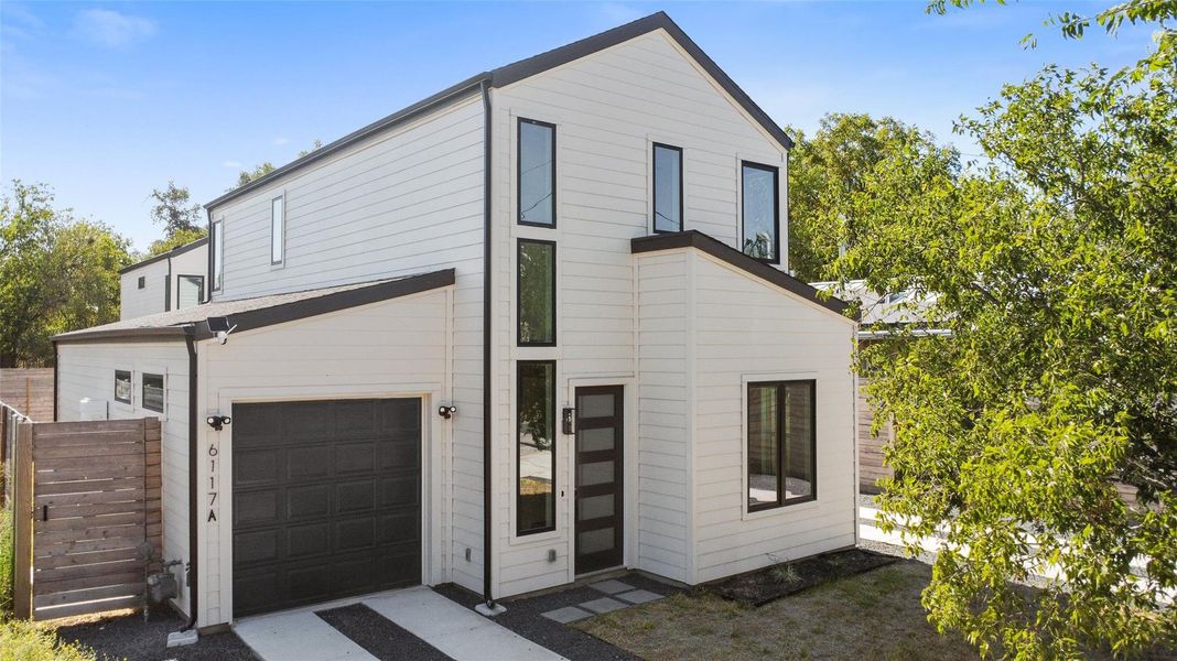 View of front of property featuring an attached garage View of front of property featuring an attached garage