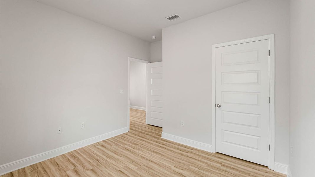 Spacious, unfurnished interior of a new home in WindMark Beach, Port Saint Joe (Image 17).