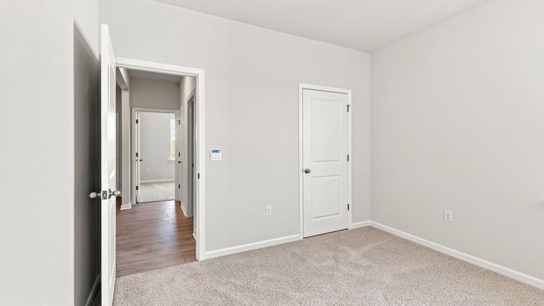 Spacious, unfurnished interior of a new home in Hunters Ridge, Woodruff (Image 22).