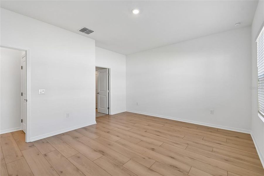 Spacious, unfurnished interior of a new home in Oakfield at Mount Dora Cottage Series, Mount Dora (Image 27). Spacious, unfurnished interior of a new home in Oakfield at Mount Dora Cottage Series, Mount Dora (Image 27).