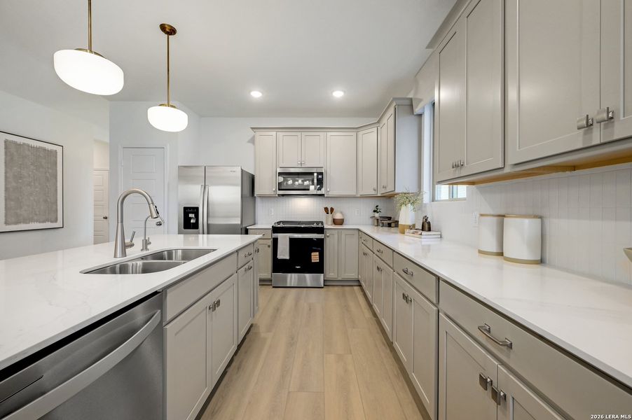 Furnished interior view inside a new home in Nopal Valley, San Antonio (Image 13).