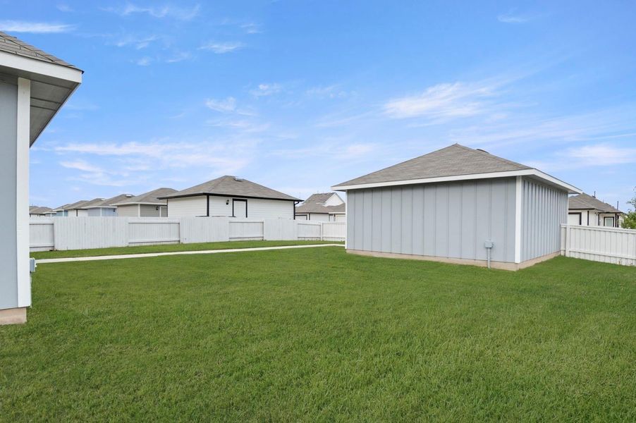 Exterior details and patio area of a home in Casetta Ranch, Kyle (Image 3).