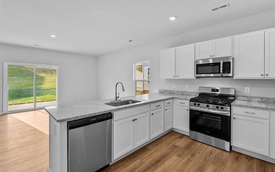 Furnished interior view inside a new home in Hanes Lake, Winston-Salem (Image 14). Furnished interior view inside a new home in Hanes Lake, Winston-Salem (Image 14).