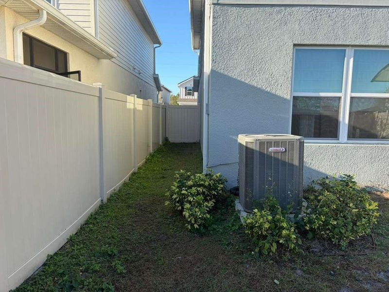 Exterior details and patio area of a home in , Harmony (Image 26).