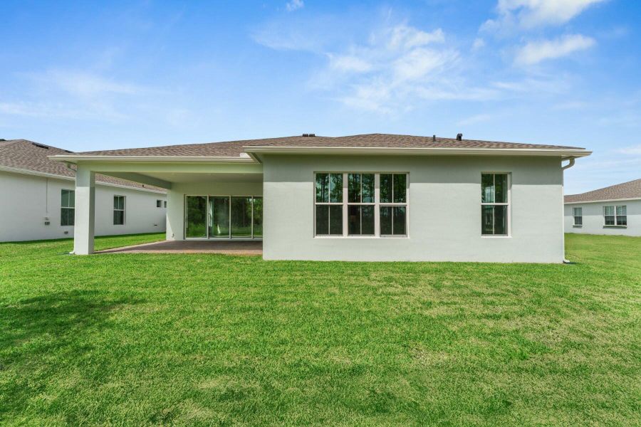Front exterior of a new home in , Port St. Lucie, FL, highlighting curb appeal (Image 23). Front exterior of a new home in , Port St. Lucie, FL, highlighting curb appeal (Image 23).