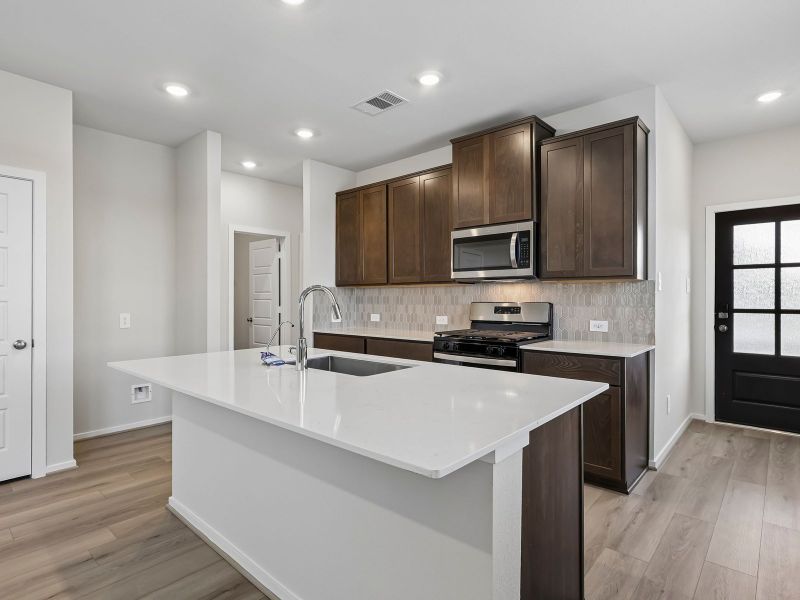 Furnished interior view inside a new home in Riviera Pines - Traditional Series, Huffman (Image 4).