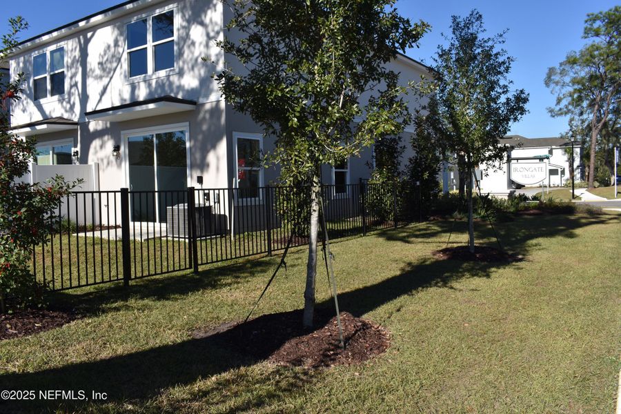 Exterior details and patio area of a home in Irongate Villas, Jacksonville (Image 3).