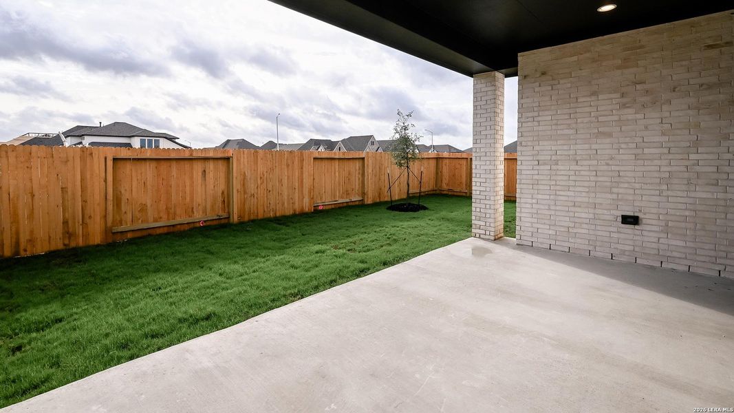 Exterior details and patio area of a home in Meadows of Mill Creek, Seguin (Image 3).
