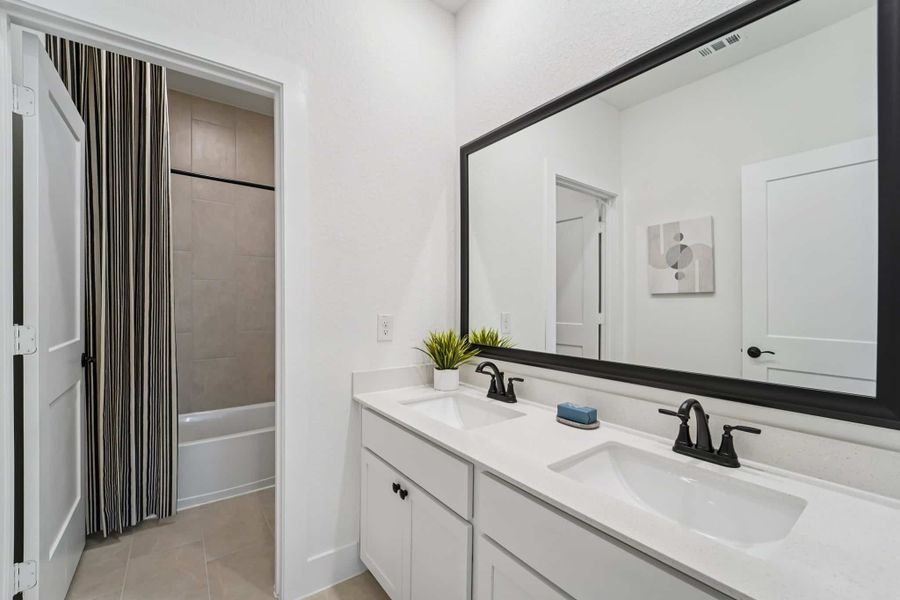 Furnished interior view inside a new home in Bridgeland, Cypress (Image 15).