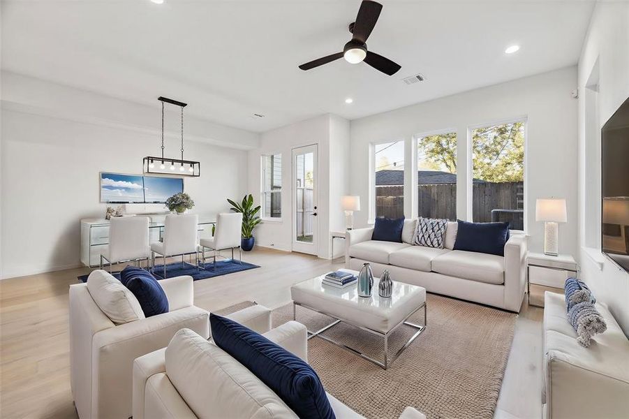 Virtually staged open concept living space, perfect for entertaining